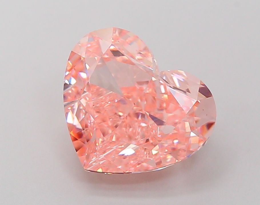 Loose Diamond - HEART 5.14ct Fancy Vivid Pink VVS2: Loose Diamond - HEART 5.14ct Fancy Vivid Pink VVS2 Source: This is a real non-mined Diamond that has been grown in a lab Shape: HEART Carats: 5.14 Color: Fancy Vivid Pink Certification: IGI Video: