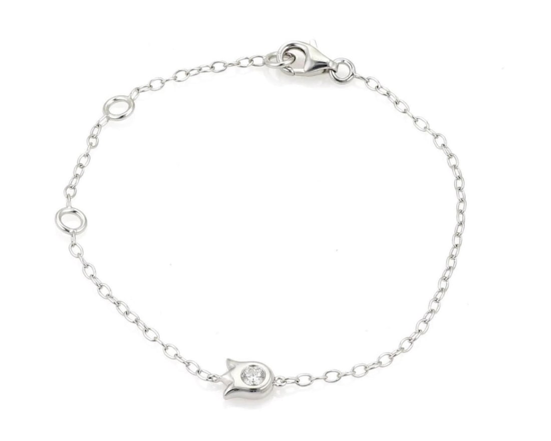 Cartier 18k White Gold Diamond Tulip Charm Bracelet with Paper: Cartier 18k White Gold Diamond Tulip Charm Bracelet with Paper This Cartier Diamond Tulip Charm Bracelet is crafted from 18k white gold and features a delicate tulip-inspired floral charm accented by 