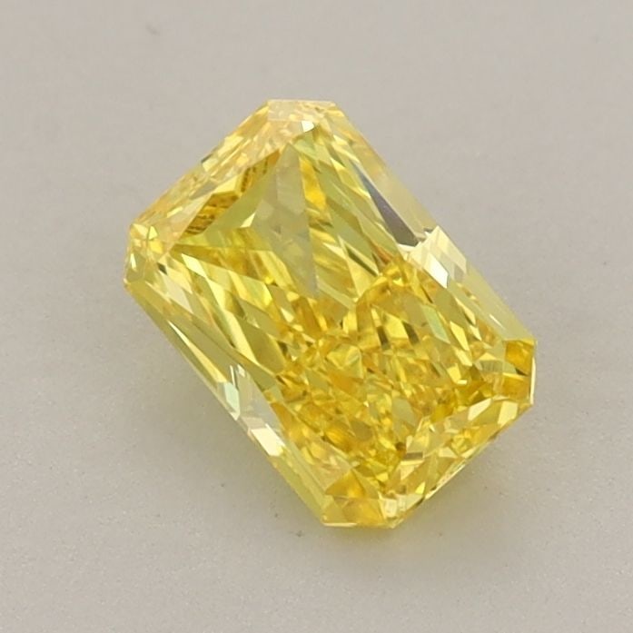 Loose Diamond - RADIANT 0.74ct Fancy Vivid Yellow VVS1: Loose Diamond - RADIANT 0.74ct Fancy Vivid Yellow VVS1 Source: This is a real non-mined Diamond that has been grown in a lab Shape: RADIANT Carats: 0.74 Color: Fancy Vivid Yellow Certification: IGI Vi