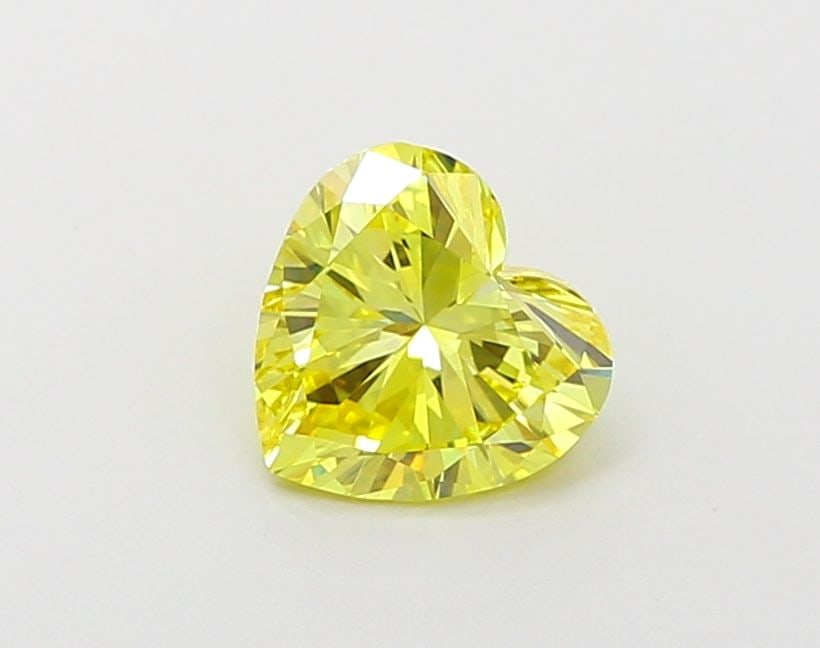 Loose Diamond - HEART 1.06ct Fancy Vivid Yellow VVS2: Loose Diamond - HEART 1.06ct Fancy Vivid Yellow VVS2 Source: This is a real non-mined Diamond that has been grown in a lab Shape: HEART Carats: 1.06 Color: Fancy Vivid Yellow Certification: IGI Video: