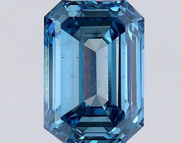 Loose Diamond - EMERALD 0.76ct Fancy Vivid Blue VS2: Loose Diamond - EMERALD 0.76ct Fancy Vivid Blue VS2 Source: This is a real non-mined Diamond that has been grown in a lab Shape: EMERALD Carats: 0.76 Color: Fancy Vivid Blue Certification: IGI Video: