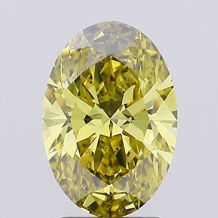 Loose Diamond - OVAL 2.04ct Fancy Vivid Yellow VVS2: Loose Diamond - OVAL 2.04ct Fancy Vivid Yellow VVS2 Source: This is a real non-mined Diamond that has been grown in a lab Shape: OVAL Carats: 2.04 Color: Fancy Vivid Yellow Certification: IGI Video: