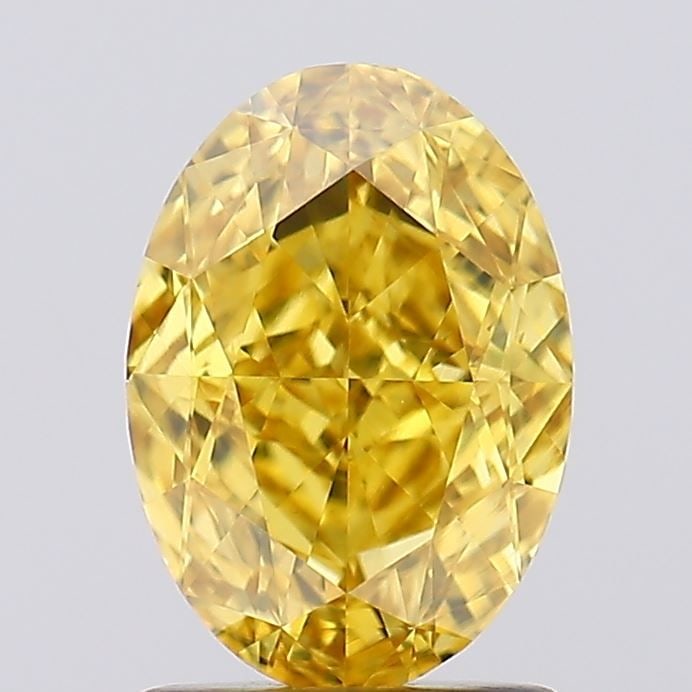Loose Diamond - OVAL 1.7ct Fancy Vivid Yellow VS1: Loose Diamond - OVAL 1.7ct Fancy Vivid Yellow VS1 Source: This is a real non-mined Diamond that has been grown in a lab Shape: OVAL Carats: 1.7 Color: Fancy Vivid Yellow Certification: IGI Video: