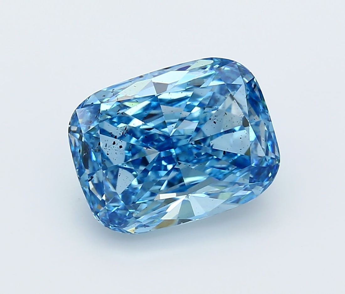 Loose Diamond - CUSHION MODIFIED 5.84ct Fancy Vivid Blue SI2: Loose Diamond - CUSHION MODIFIED 5.84ct Fancy Vivid Blue SI2 Source: This is a real non-mined Diamond that has been grown in a lab Shape: CUSHION MODIFIED Carats: 5.84 Color: Fancy Vivid Blue Certific
