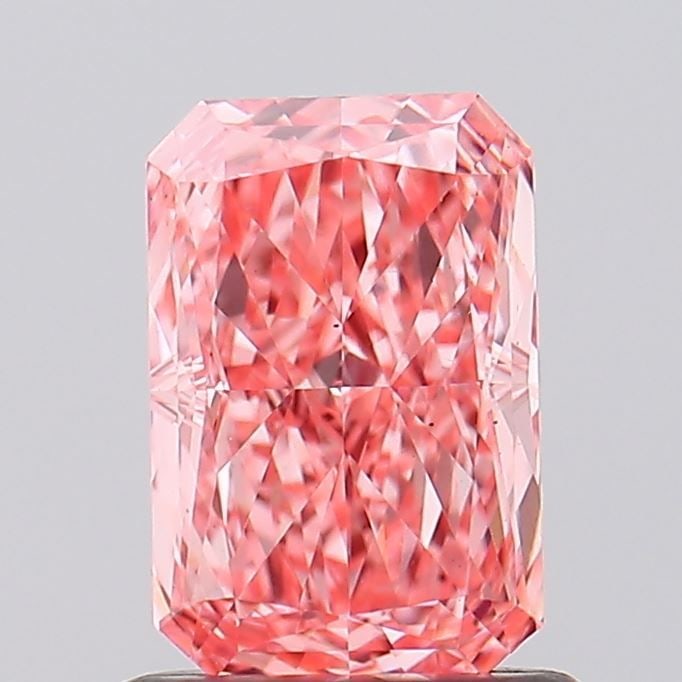 Loose Diamond - RADIANT 1.04ct Fancy Vivid Pink VS2: Loose Diamond - RADIANT 1.04ct Fancy Vivid Pink VS2 Source: This is a real non-mined Diamond that has been grown in a lab Shape: RADIANT Carats: 1.04 Color: Fancy Vivid Pink Certification: IGI Video:
