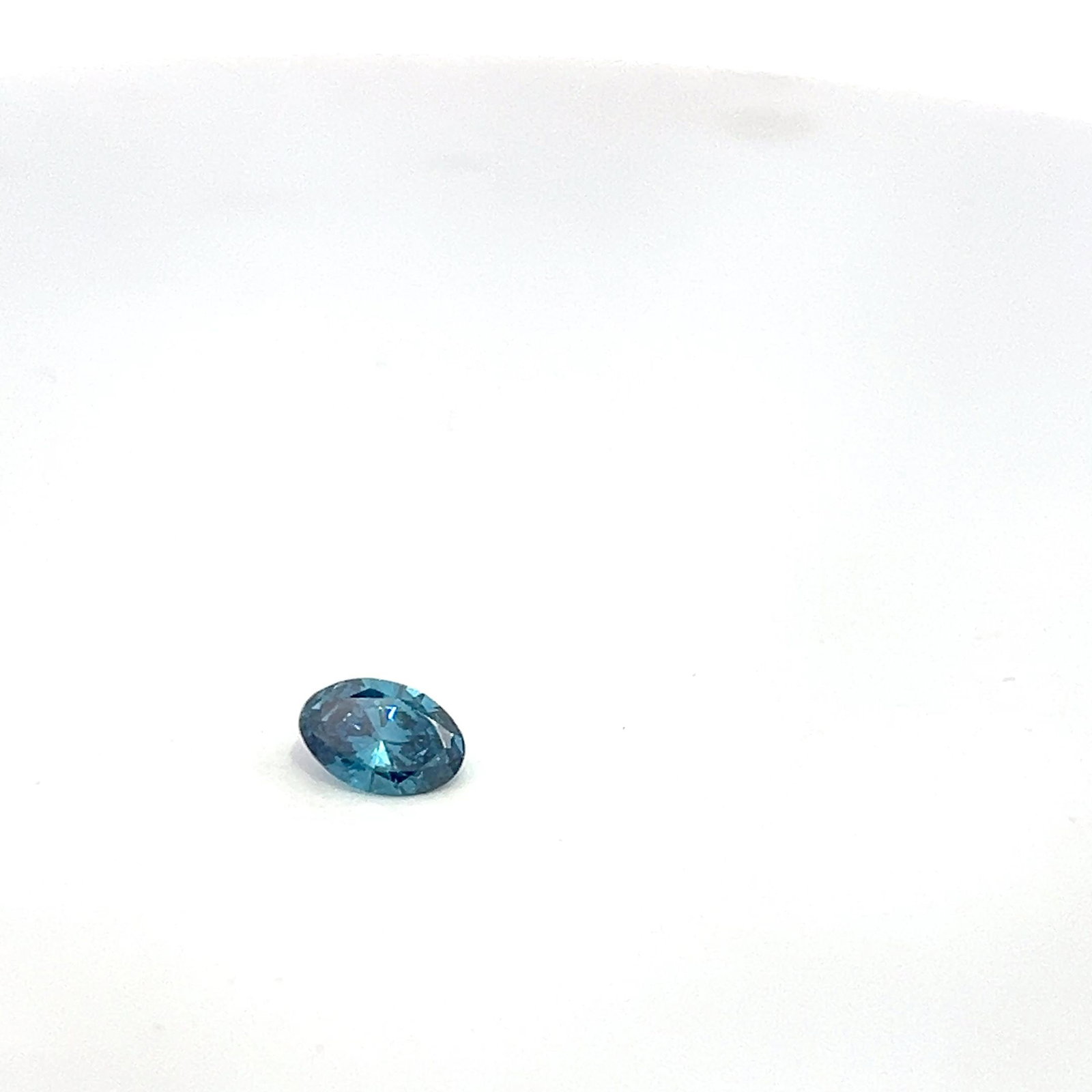 Loose Diamond - OVAL 1.0ct Fancy Blue I1: Loose Diamond - OVAL 1.0ct Fancy Blue I1 Source: This is a real non-mined Diamond that has been grown in a lab Shape: OVAL Carats: 1.0 Color: Fancy Blue Certification: NONE The Diamond Depot Guarantee