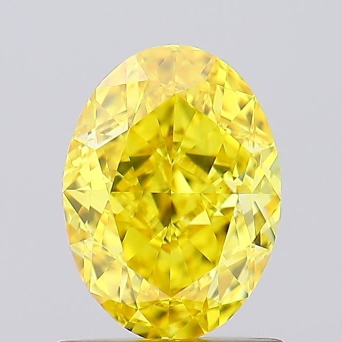 Loose Diamond - OVAL 1.24ct Fancy Vivid Yellow VVS2: Loose Diamond - OVAL 1.24ct Fancy Vivid Yellow VVS2 Source: This is a real non-mined Diamond that has been grown in a lab Shape: OVAL Carats: 1.24 Color: Fancy Vivid Yellow Certification: IGI Video: