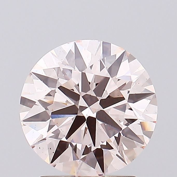 Ideal Loose Diamond - ROUND 2.06ct Fancy Light Pink VS2: Ideal Loose Diamond - ROUND 2.06ct Fancy Light Pink VS2 Source: This is a real non-mined Diamond that has been grown in a lab Shape: ROUND Carats: 2.06 Color: Fancy Light Pink Certification: IGI Video