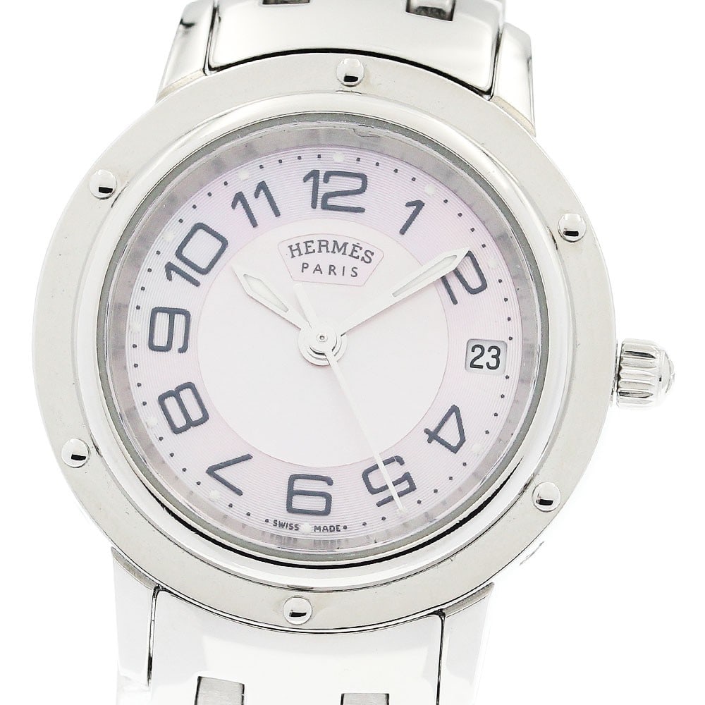 Hermes Clipper Date Pink Shell Quartz Ladies Wristwatch CP1.210: Hermes Clipper Date Pink Shell Quartz Ladies Wristwatch CP1.210 This Hermes Clipper Date Quartz ladies wristwatch features a stainless steel case and bracelet with a pink shell dial. The watch is powe