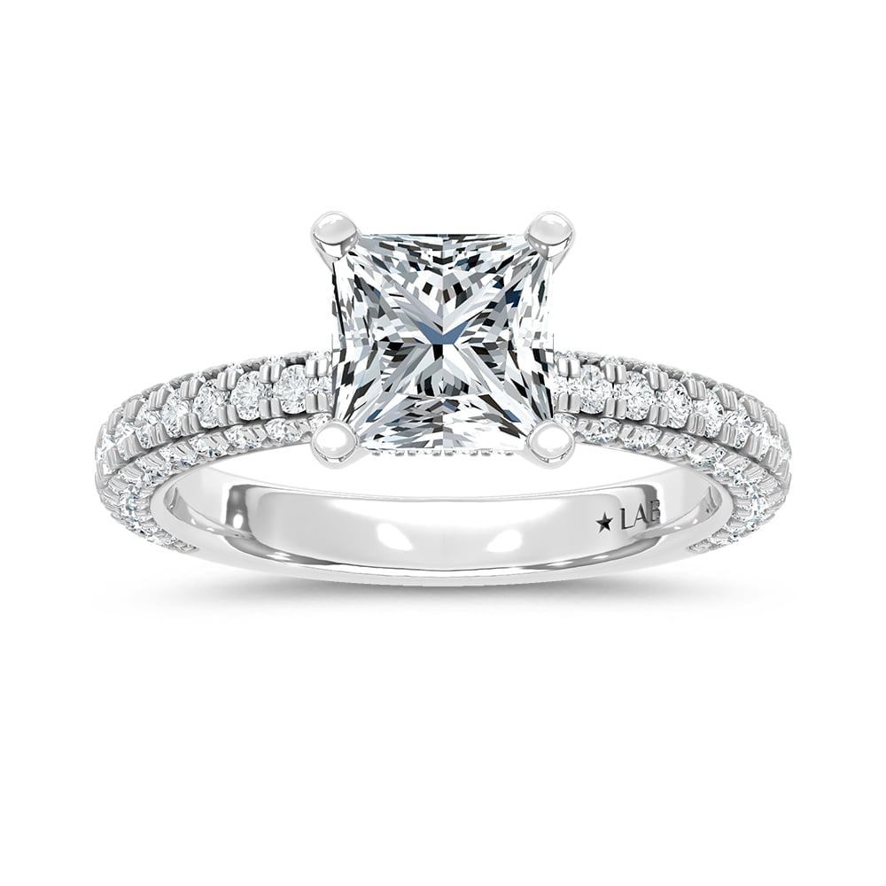 14K White Gold Lab Grown Diamond 4 Ct.Tw. Princess Shape Halo Engagement Ring (IGI Certified Center: 14K White Gold Lab Grown Diamond 4 Ct.Tw. Princess Shape Halo Engagement Ring (IGI Certified Center 3ct) Discover subtle brilliance and modern elegance with our Hidden Halo Diamond Engagement Ring. Th
