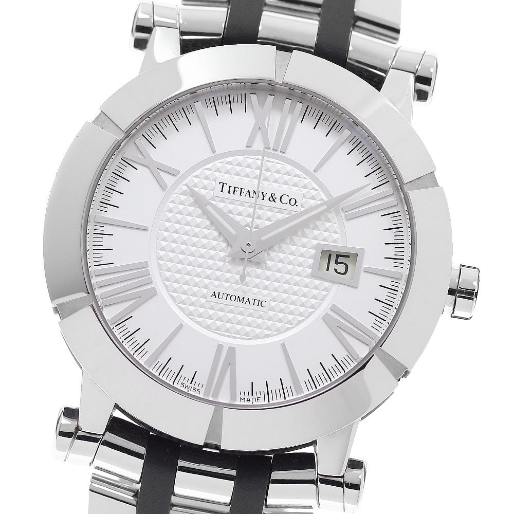 Tiffany Atlas men's automatic date wristwatch stainless steel rubber 42mm: Tiffany Atlas men's automatic date wristwatch stainless steel rubber 42mm This pre-owned Tiffany & Co. Atlas Date men's wristwatch features a stainless steel and rubber case and band, with a silver di