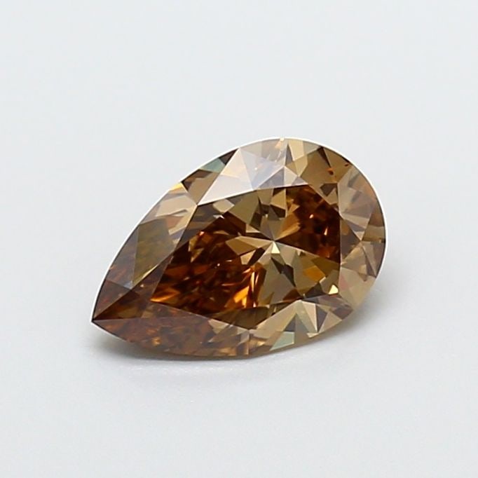 Loose Diamond - PEAR 1.03ct Fancy Brown VVS2: Loose Diamond - PEAR 1.03ct Fancy Brown VVS2 Source: This is a real non-mined Diamond that has been grown in a lab Shape: PEAR Carats: 1.03 Color: Fancy Brown Certification: IGI Video: