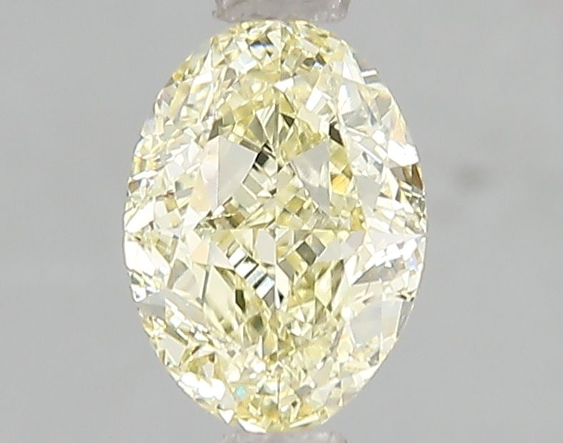 Loose Diamond - OVAL 1.39ct Fancy Yellow VS1: Loose Diamond - OVAL 1.39ct Fancy Yellow VS1 Source: This is a real non-mined Diamond that has been grown in a lab Shape: OVAL Carats: 1.39 Color: Fancy Yellow Certification: IGI Video: