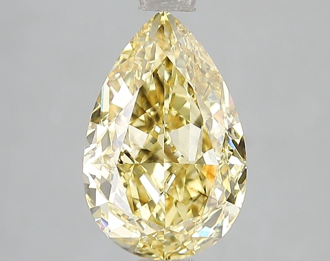 Loose Diamond - PEAR 3.05ct Fancy Vivid Yellow SI1: Loose Diamond - PEAR 3.05ct Fancy Vivid Yellow SI1 Source: This is a real non-mined Diamond that has been grown in a lab Shape: PEAR Carats: 3.05 Color: Fancy Vivid Yellow Certification: IGI Video: