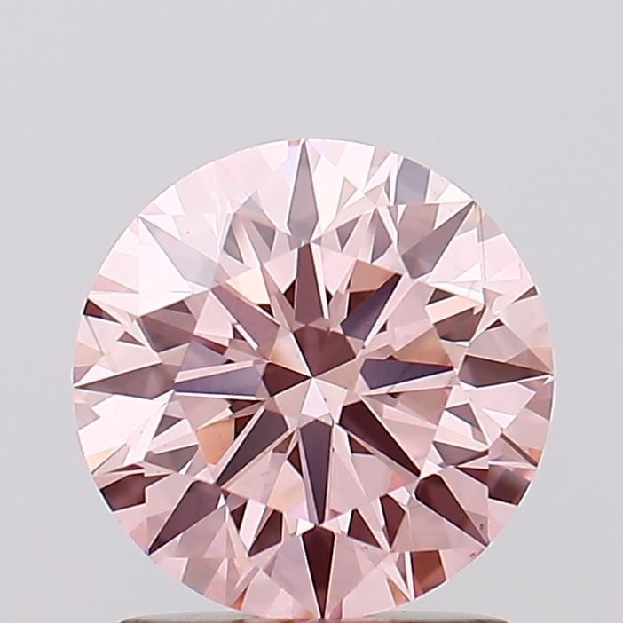 Ideal Loose Diamond - ROUND 1.43ct Fancy Vivid Pink VS2: Ideal Loose Diamond - ROUND 1.43ct Fancy Vivid Pink VS2 Source: This is a real non-mined Diamond that has been grown in a lab Shape: ROUND Carats: 1.43 Color: Fancy Vivid Pink Certification: IGI Video