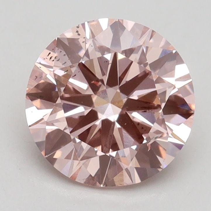 Loose Diamond - ROUND 1.7ct Fancy Intense Pink SI1: Loose Diamond - ROUND 1.7ct Fancy Intense Pink SI1 Source: This is a real non-mined Diamond that has been grown in a lab Shape: ROUND Carats: 1.7 Color: Fancy Intense Pink Certification: IGI Video: