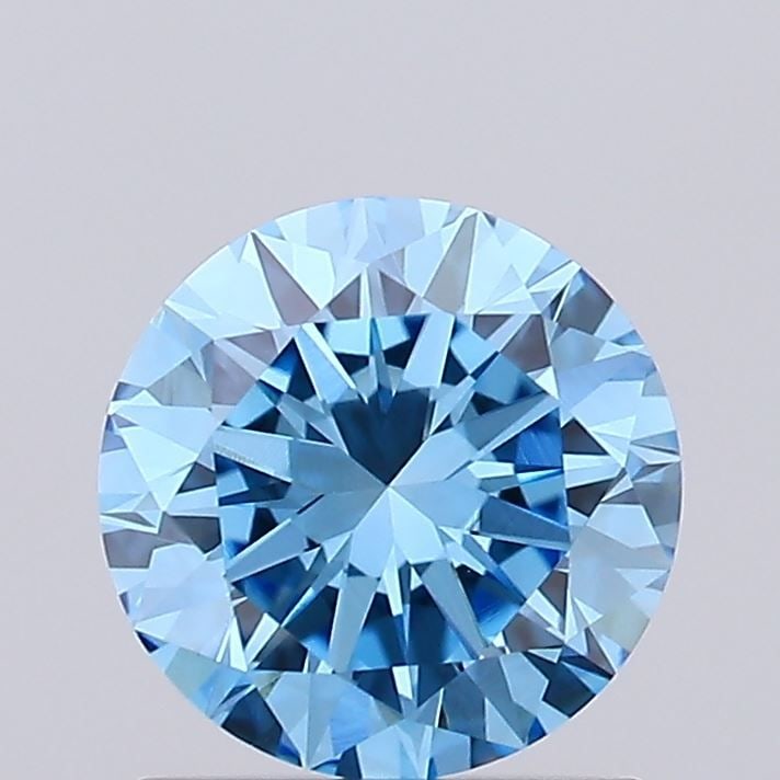 Loose Diamond - ROUND 0.92ct Fancy Vivid Blue VS1: Loose Diamond - ROUND 0.92ct Fancy Vivid Blue VS1 Source: This is a real non-mined Diamond that has been grown in a lab Shape: ROUND Carats: 0.92 Color: Fancy Vivid Blue Certification: IGI Video: