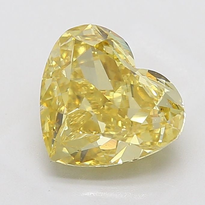 Loose Diamond - HEART 5.01ct Fancy Intense Yellow VS2: Loose Diamond - HEART 5.01ct Fancy Intense Yellow VS2 Source: This is a real non-mined Diamond that has been grown in a lab Shape: HEART Carats: 5.01 Color: Fancy Intense Yellow Certification: IGI Vid