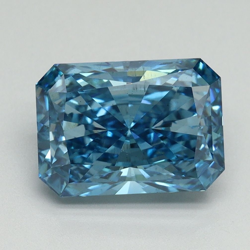 Loose Diamond - RADIANT 3.14ct Fancy Vivid Blue VS2: Loose Diamond - RADIANT 3.14ct Fancy Vivid Blue VS2 Source: This is a real non-mined Diamond that has been grown in a lab Shape: RADIANT Carats: 3.14 Color: Fancy Vivid Blue Certification: IGI Video: