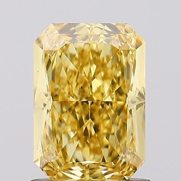Loose Diamond - RADIANT 1.13ct Fancy Vivid Yellow VS1: Loose Diamond - RADIANT 1.13ct Fancy Vivid Yellow VS1 Source: This is a real non-mined Diamond that has been grown in a lab Shape: RADIANT Carats: 1.13 Color: Fancy Vivid Yellow Certification: IGI Vid