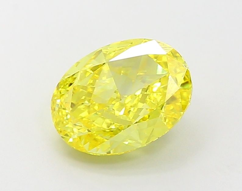 Loose Diamond - OVAL 3.07ct Fancy Vivid Yellow VVS2: Loose Diamond - OVAL 3.07ct Fancy Vivid Yellow VVS2 Source: This is a real non-mined Diamond that has been grown in a lab Shape: OVAL Carats: 3.07 Color: Fancy Vivid Yellow Certification: IGI Video: