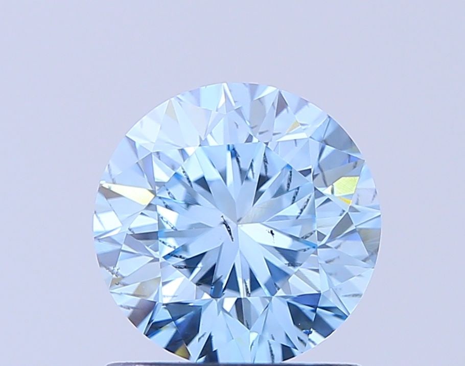 Loose Diamond - ROUND 1.2ct Fancy Vivid Blue SI1: Loose Diamond - ROUND 1.2ct Fancy Vivid Blue SI1 Source: This is a real non-mined Diamond that has been grown in a lab Shape: ROUND Carats: 1.2 Color: Fancy Vivid Blue Certification: NONE Video: