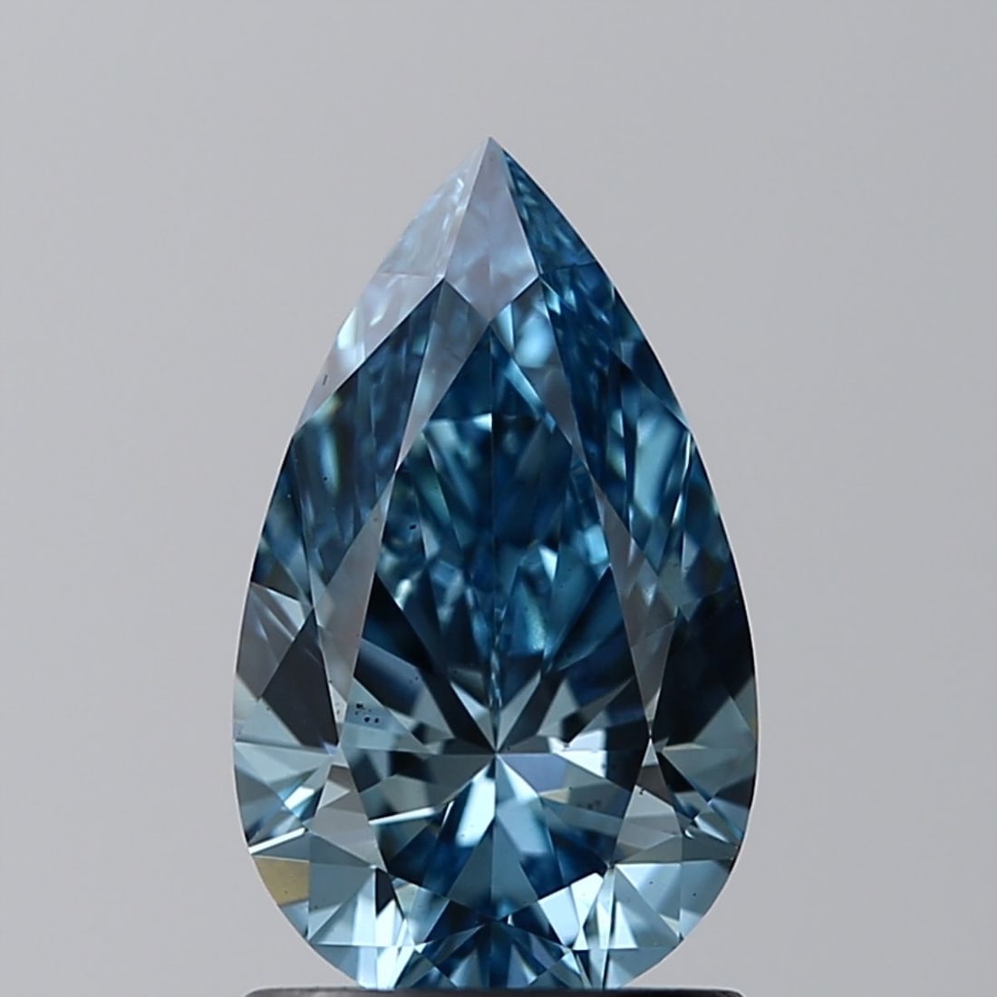 Loose Diamond - PEAR 1.2ct Fancy Vivid Blue VS2: Loose Diamond - PEAR 1.2ct Fancy Vivid Blue VS2 Source: This is a real non-mined Diamond that has been grown in a lab Shape: PEAR Carats: 1.2 Color: Fancy Vivid Blue Certification: IGI Video: