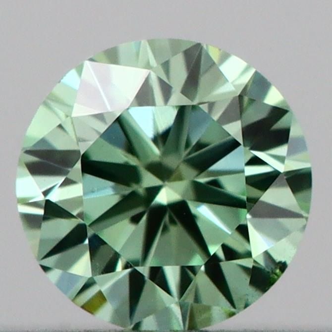 Loose Diamond - ROUND 0.16ct Fancy Vivid Green VS1: Loose Diamond - ROUND 0.16ct Fancy Vivid Green VS1 Source: This is a real non-mined Diamond that has been grown in a lab Shape: ROUND Carats: 0.16 Color: Fancy Vivid Green Certification: IGI Video: