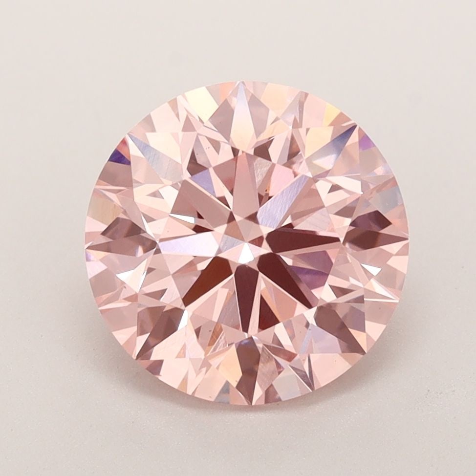 Ideal Loose Diamond - ROUND 3.16ct Fancy Vivid Pink VS1: Ideal Loose Diamond - ROUND 3.16ct Fancy Vivid Pink VS1 Source: This is a real non-mined Diamond that has been grown in a lab Shape: ROUND Carats: 3.16 Color: Fancy Vivid Pink Certification: IGI Video