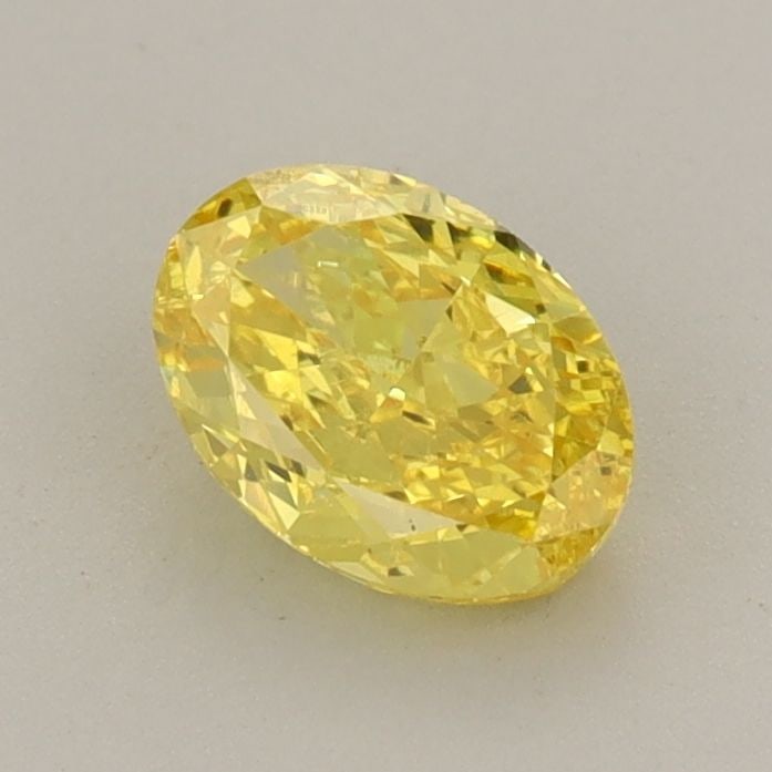 Loose Diamond - OVAL 0.76ct Fancy Vivid Yellow VS1: Loose Diamond - OVAL 0.76ct Fancy Vivid Yellow VS1 Source: This is a real non-mined Diamond that has been grown in a lab Shape: OVAL Carats: 0.76 Color: Fancy Vivid Yellow Certification: IGI Video: