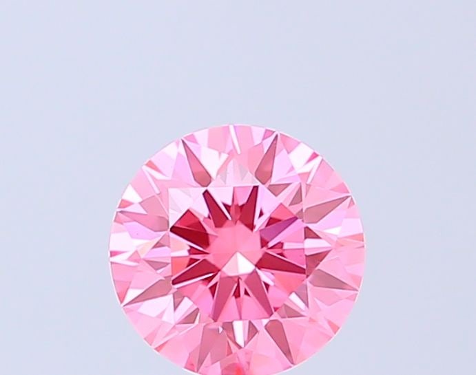 Ideal Loose Diamond - ROUND 1.08ct Fancy Vivid Pink VVS2: Ideal Loose Diamond - ROUND 1.08ct Fancy Vivid Pink VVS2 Source: This is a real non-mined Diamond that has been grown in a lab Shape: ROUND Carats: 1.08 Color: Fancy Vivid Pink Certification: IGI Vide