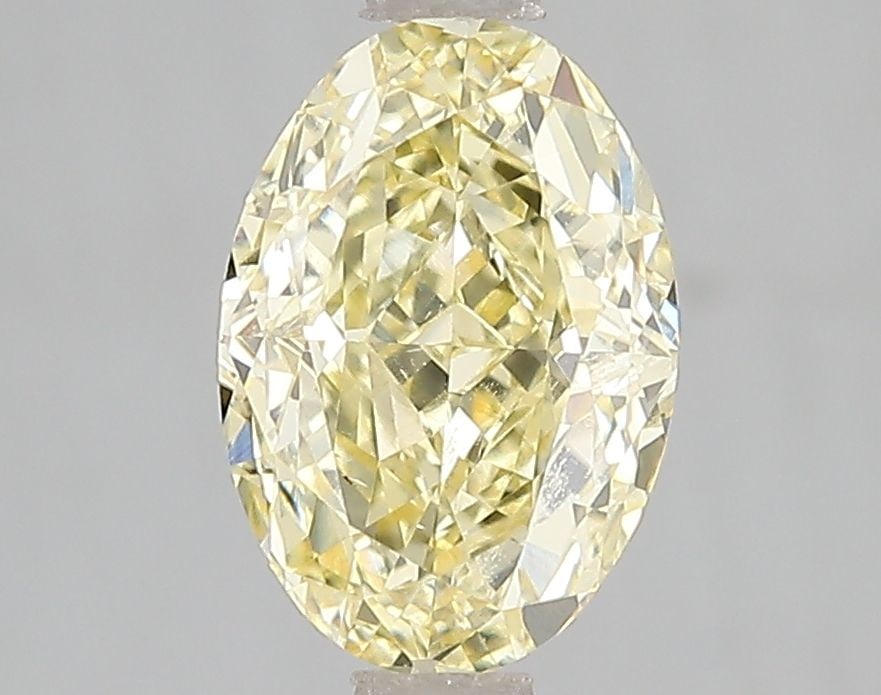 Loose Diamond - OVAL 2.01ct Fancy Vivid Yellow VS1: Loose Diamond - OVAL 2.01ct Fancy Vivid Yellow VS1 Source: This is a real non-mined Diamond that has been grown in a lab Shape: OVAL Carats: 2.01 Color: Fancy Vivid Yellow Certification: IGI Video: