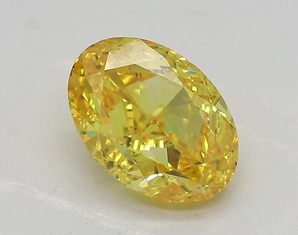 Loose Diamond - OVAL 1.55ct Fancy Vivid Yellow VVS1: Loose Diamond - OVAL 1.55ct Fancy Vivid Yellow VVS1 Source: This is a real non-mined Diamond that has been grown in a lab Shape: OVAL Carats: 1.55 Color: Fancy Vivid Yellow Certification: IGI Video: