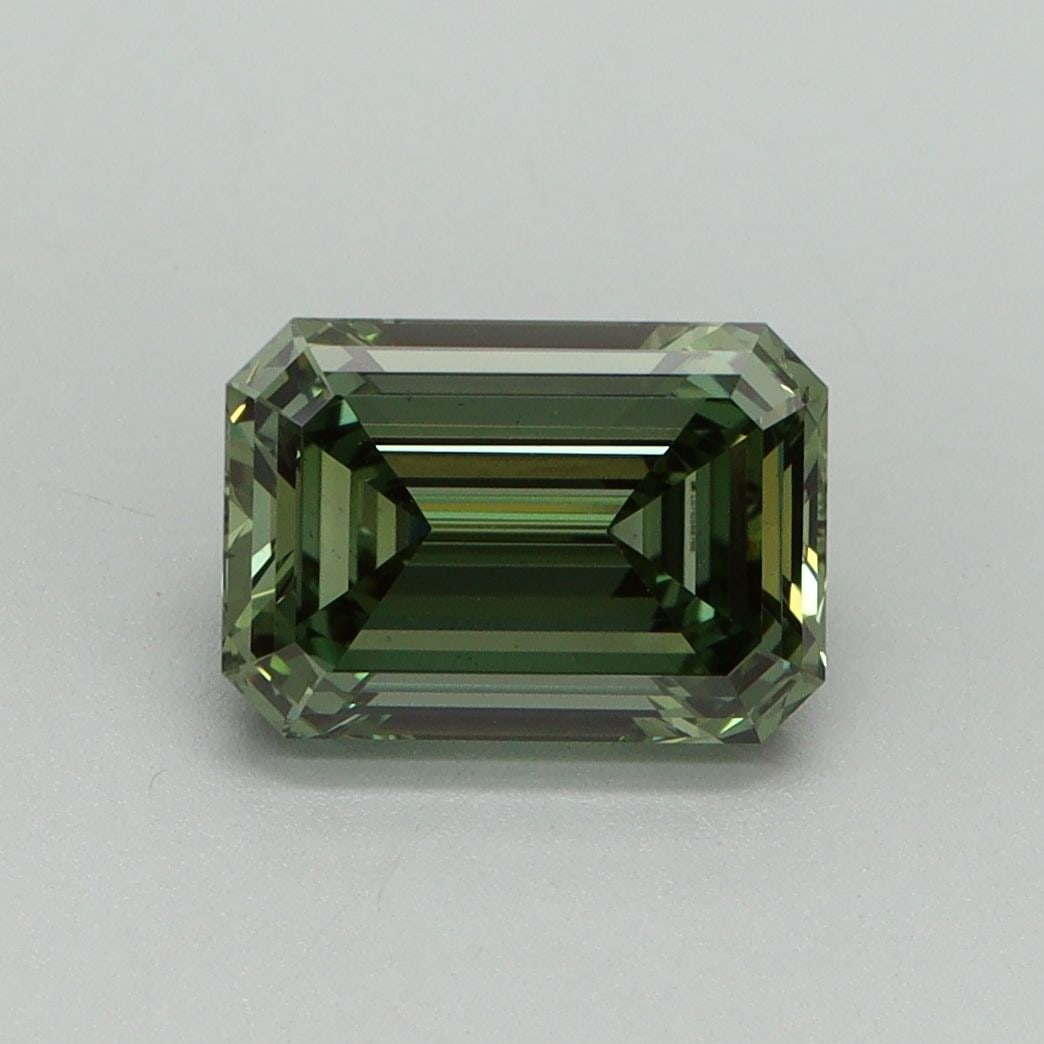 Loose Diamond - EMERALD 1.59ct Fancy Vivid Green VVS2: Loose Diamond - EMERALD 1.59ct Fancy Vivid Green VVS2 Source: This is a real non-mined Diamond that has been grown in a lab Shape: EMERALD Carats: 1.59 Color: Fancy Vivid Green Certification: IGI Vide