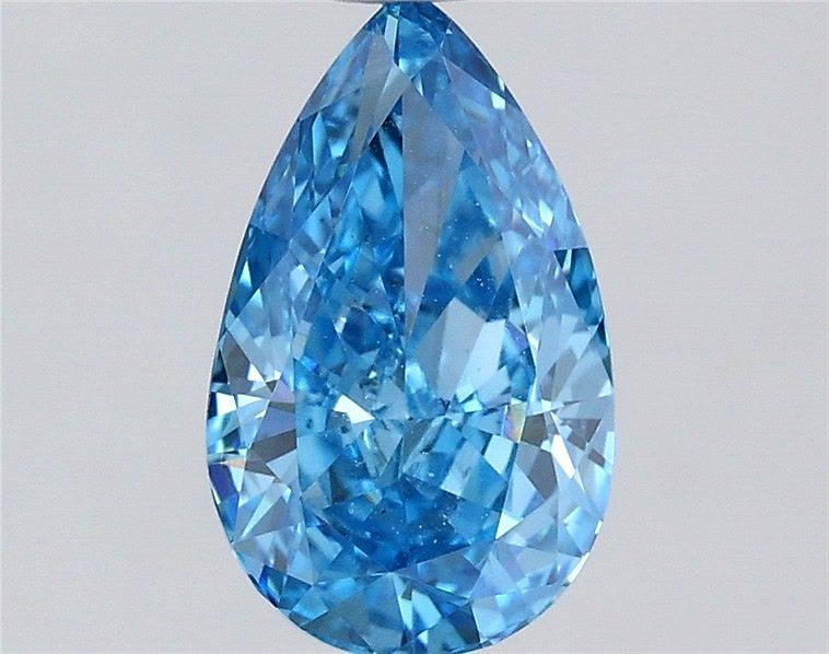 Loose Diamond - PEAR 1.0ct Fancy Vivid Blue VS1: Loose Diamond - PEAR 1.0ct Fancy Vivid Blue VS1 Source: This is a real non-mined Diamond that has been grown in a lab Shape: PEAR Carats: 1.0 Color: Fancy Vivid Blue Certification: IGI Video: