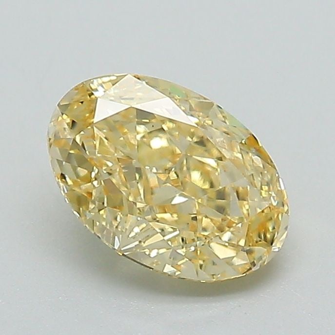 Loose Diamond - OVAL 1.06ct Fancy Vivid Yellow VS1: Loose Diamond - OVAL 1.06ct Fancy Vivid Yellow VS1 Source: This is a real non-mined Diamond that has been grown in a lab Shape: OVAL Carats: 1.06 Color: Fancy Vivid Yellow Certification: IGI Video: