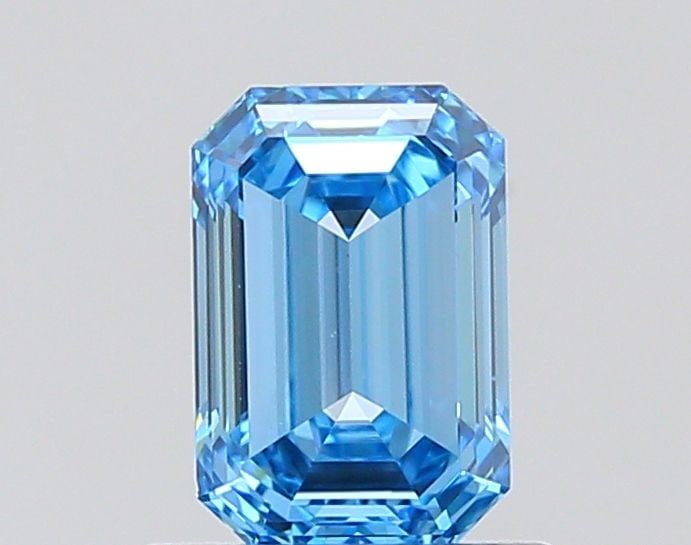 Loose Diamond - EMERALD 0.71ct Fancy Vivid Blue VVS1: Loose Diamond - EMERALD 0.71ct Fancy Vivid Blue VVS1 Source: This is a real non-mined Diamond that has been grown in a lab Shape: EMERALD Carats: 0.71 Color: Fancy Vivid Blue Certification: IGI Video: