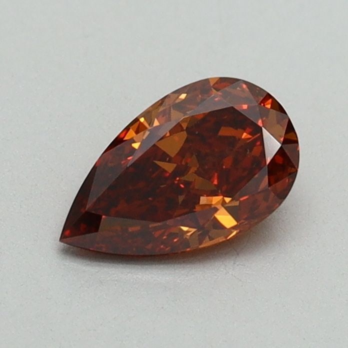 Loose Diamond - PEAR 0.55ct Fancy Orange VVS2: Loose Diamond - PEAR 0.55ct Fancy Orange VVS2 Source: This is a real non-mined Diamond that has been grown in a lab Shape: PEAR Carats: 0.55 Color: Fancy Orange Certification: IGI Video: