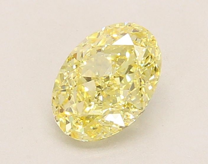 Loose Diamond - OVAL 1.01ct Fancy Yellow VVS2: Loose Diamond - OVAL 1.01ct Fancy Yellow VVS2 Source: This is a real non-mined Diamond that has been grown in a lab Shape: OVAL Carats: 1.01 Color: Fancy Yellow Certification: IGI Video: