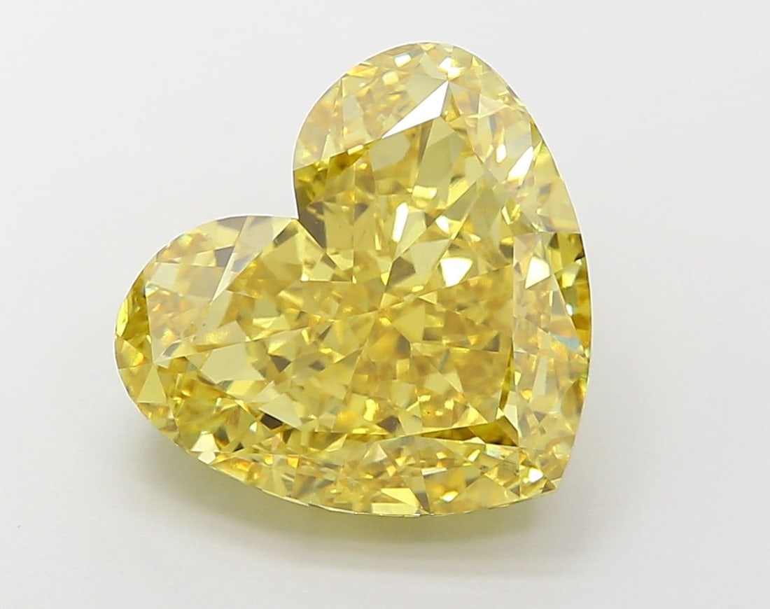 Loose Diamond - HEART 10.3ct Fancy Vivid Yellow VVS2: Loose Diamond - HEART 10.3ct Fancy Vivid Yellow VVS2 Source: This is a real non-mined Diamond that has been grown in a lab Shape: HEART Carats: 10.3 Color: Fancy Vivid Yellow Certification: IGI Video: