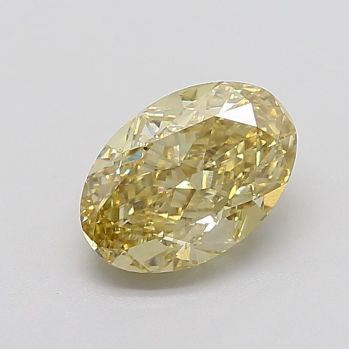 Loose Diamond - OVAL 3.11ct Fancy Yellow VS1: Loose Diamond - OVAL 3.11ct Fancy Yellow VS1 Source: This is a real non-mined Diamond that has been grown in a lab Shape: OVAL Carats: 3.11 Color: Fancy Yellow Certification: IGI Video: