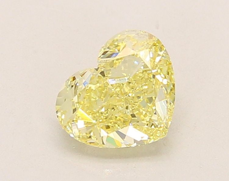 Loose Diamond - HEART 1.25ct Fancy Yellow VVS2: Loose Diamond - HEART 1.25ct Fancy Yellow VVS2 Source: This is a real non-mined Diamond that has been grown in a lab Shape: HEART Carats: 1.25 Color: Fancy Yellow Certification: IGI Video: