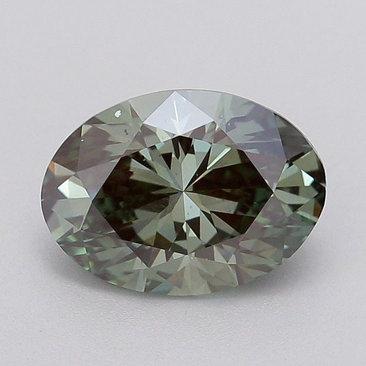 Loose Diamond - OVAL 2.09ct Fancy Vivid Green VS2: Loose Diamond - OVAL 2.09ct Fancy Vivid Green VS2 Source: This is a real non-mined Diamond that has been grown in a lab Shape: OVAL Carats: 2.09 Color: Fancy Vivid Green Certification: IGI Video: