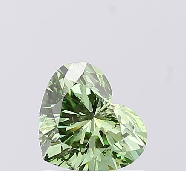 Loose Diamond - HEART 0.92ct Fancy Vivid Green SI2: Loose Diamond - HEART 0.92ct Fancy Vivid Green SI2 Source: This is a real non-mined Diamond that has been grown in a lab Shape: HEART Carats: 0.92 Color: Fancy Vivid Green Certification: IGI Video: