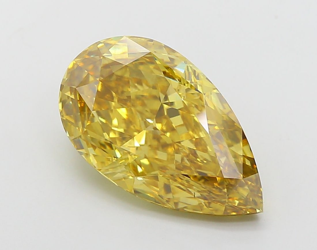 Loose Diamond - PEAR 6.27ct Fancy Vivid Brownish Yellow VS1: Loose Diamond - PEAR 6.27ct Fancy Vivid Brownish Yellow VS1 Source: This is a real non-mined Diamond that has been grown in a lab Shape: PEAR Carats: 6.27 Color: Fancy Vivid Brownish Yellow Certificat