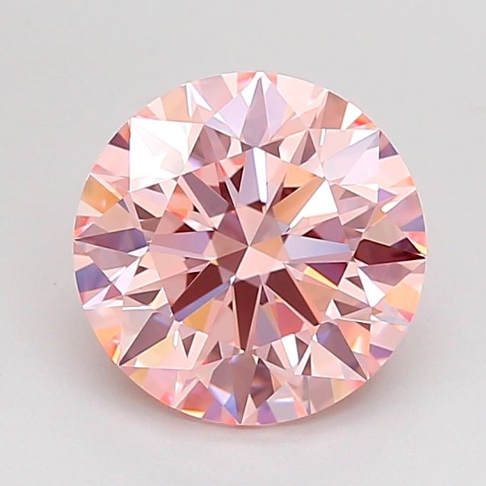 Ideal Loose Diamond - ROUND 2.2ct Fancy Vivid Pink VVS2: Ideal Loose Diamond - ROUND 2.2ct Fancy Vivid Pink VVS2 Source: This is a real non-mined Diamond that has been grown in a lab Shape: ROUND Carats: 2.2 Color: Fancy Vivid Pink Certification: IGI Video: