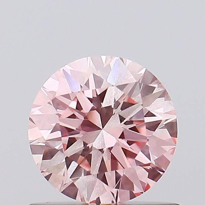 Loose Diamond - ROUND 0.68ct Fancy Intense Pink SI1: Loose Diamond - ROUND 0.68ct Fancy Intense Pink SI1 Source: This is a real non-mined Diamond that has been grown in a lab Shape: ROUND Carats: 0.68 Color: Fancy Intense Pink Certification: IGI Video: