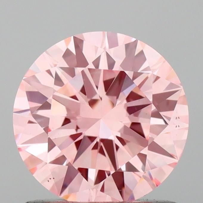 Loose Diamond - ROUND 0.93ct Fancy Vivid Pink VS1: Loose Diamond - ROUND 0.93ct Fancy Vivid Pink VS1 Source: This is a real non-mined Diamond that has been grown in a lab Shape: ROUND Carats: 0.93 Color: Fancy Vivid Pink Certification: IGI Video: