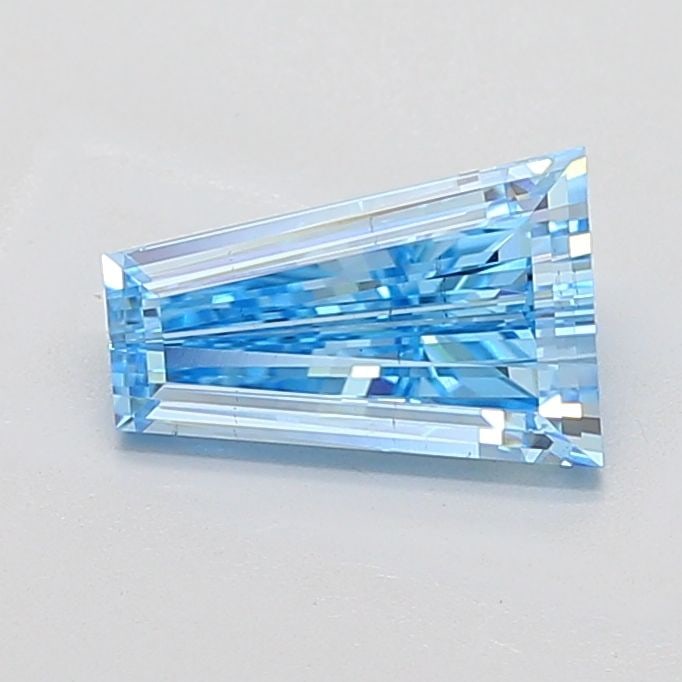 Loose Diamond - TAPERED BAGUETTE 2.0ct Fancy Vivid Blue VS2: Loose Diamond - TAPERED BAGUETTE 2.0ct Fancy Vivid Blue VS2 Source: This is a real non-mined Diamond that has been grown in a lab Shape: TAPERED BAGUETTE Carats: 2.0 Color: Fancy Vivid Blue Certificat