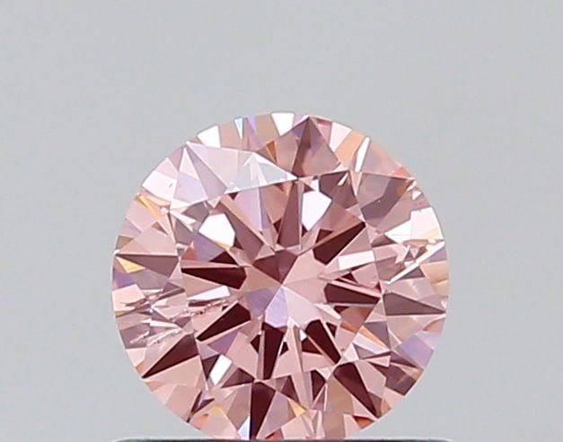 Loose Diamond - ROUND 0.61ct Fancy Vivid Pink I1: Loose Diamond - ROUND 0.61ct Fancy Vivid Pink I1 Source: This is a real non-mined Diamond that has been grown in a lab Shape: ROUND Carats: 0.61 Color: Fancy Vivid Pink Certification: NONE The Diamond
